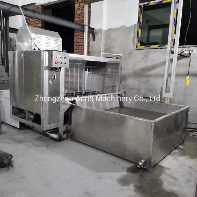 A linha comercial cabelo da chacina do porco do uso do porco da máquina de processamento da carne de porco que remove o equipamento para o matadouro dos suínos depila a máquina
