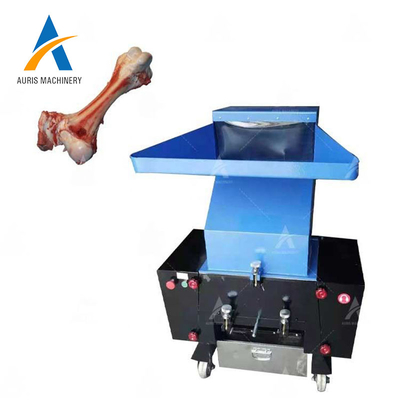 O moedor animal Machine Crushing Meat do osso que corta a carne de porco da carne marca a retalhadora da serra da carne